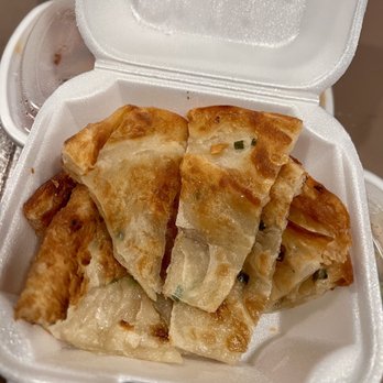 Jasmine Asian Bistro - Onion Cake - Yum!! Very light but crispy at the same time with lots of layers too. Would've liked more green onions though. - Chinese Near Me - Louisville, Kentucky Jasmine Asian Bistro - Onion Cake - Yum!! Very light but crispy at the same time with lots of layers too. Would've liked more green onions though. - Chinese Near Me - Louisville, Kentucky