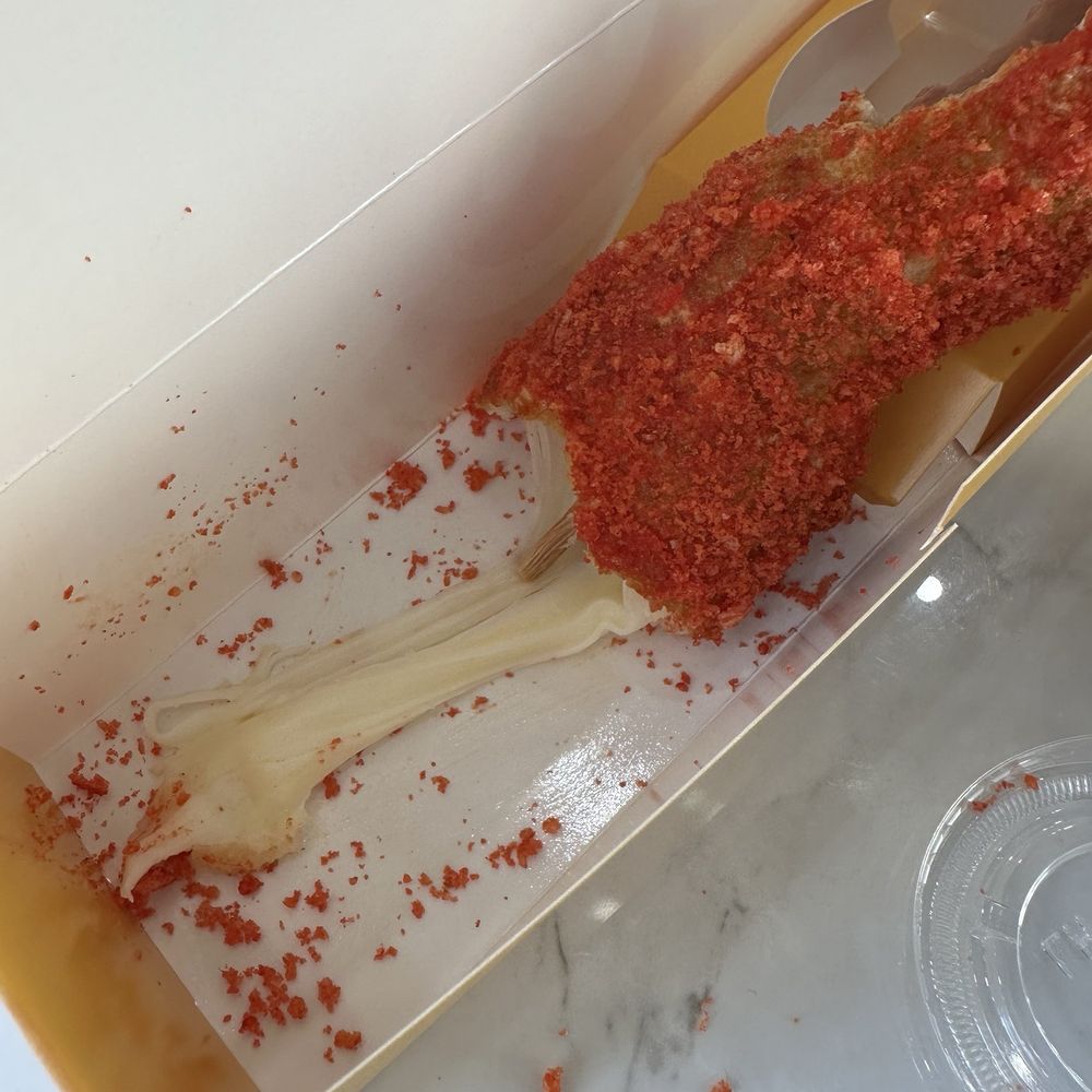 Mochinut - Hot Cheetos Half & Half cheese pull! - Donuts Near Me - Cary, North Carolina