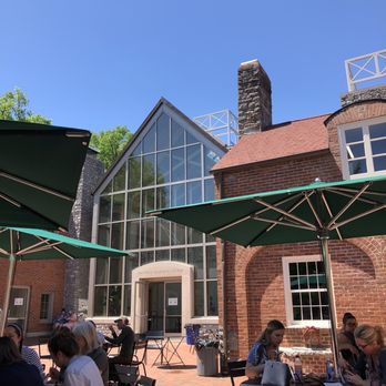 Cafe 29 - a group of people sitting at tables under umbrellas - Coffee & Tea Near Me - Nashville, Tennessee Cafe 29 - a group of people sitting at tables under umbrellas - Coffee & Tea Near Me - Nashville, Tennessee
