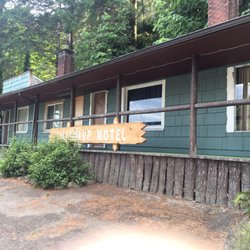Lilliwaup Motel - Run down hotel exterior. It faces the highway.