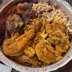 Yeh Mon Jamaican Restaurant - Curry chicken with rice and beans and fried plantains