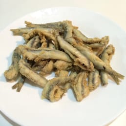 Fried anchovies. Our free tapa for ordering drinks. Fried anchovies. Our free tapa for ordering drinks.