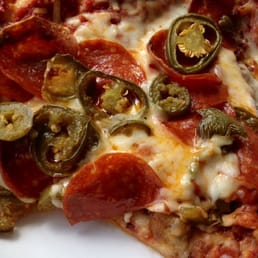 Pepperoni and jalapeño pizza. Pepperoni and jalapeño pizza.
