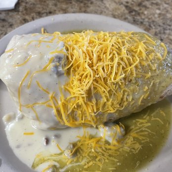 Carolyn's Cafe - Smothered breakfast burrito. Half green salsa/half gravy $9.95 - Breakfast & Brunch Near Me - Redlands, California