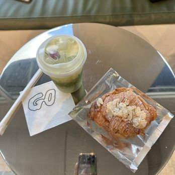 Go Culture Cafe - Saffron matcha and almond croissant - Coffee & Tea Near Me - Dallas, Texas Go Culture Cafe - Saffron matcha and almond croissant - Coffee & Tea Near Me - Dallas, Texas