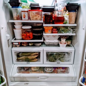 The Cleaning Solution - Every surface in the fridge is clean. - Home Cleaning Near Me