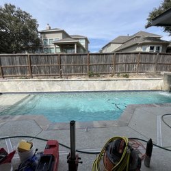 Pool with water features on. Landscaping not done yet at time of photo taken