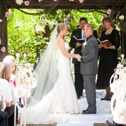 The arbor was simply breathtaking.... a floral chandelier, draped with crystals and decorated with flowers....