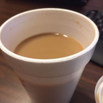 Dunkin' -  a cup of coffee on a table - Donuts Near Me - Covington, Georgia