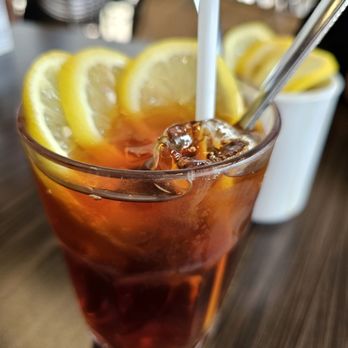 Metro Square Cafe Restaurant - a glass of iced tea with lemon wedges - Cafes Near Me - Markham, Ontario