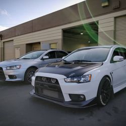 Pristine Parts - Evo's roof wrapped in gloss black.