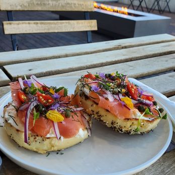 Villa Myriam Roasting - Salmon bagel w fire pit background - Coffee Roasteries Near Me - Albuquerque, New Mexico