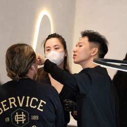 Inked VIP Studio - Team ensuring every detail is done with precision.