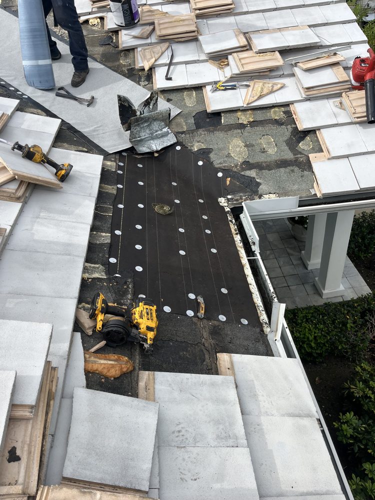 Slide of Francis Roofing Solutions