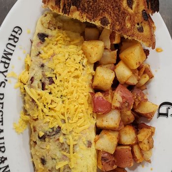 Grumpy's Restaurant - Three Meat Omelet, Potatoes and Cinnamon Raisin toast - Breakfast & Brunch Near Me - Orange Park, Florida Grumpy's Restaurant - Three Meat Omelet, Potatoes and Cinnamon Raisin toast - Breakfast & Brunch Near Me - Orange Park, Florida