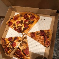 Pizza Hut - Tasted like toilet water. The kids grabbed some slices before I got the pic. Not sure what that black stuff is.