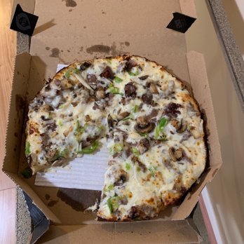 Domino's Pizza - a half eaten pizza in a box - Pizza Near Me - Hueytown, Alabama Domino's Pizza - a half eaten pizza in a box - Pizza Near Me - Hueytown, Alabama