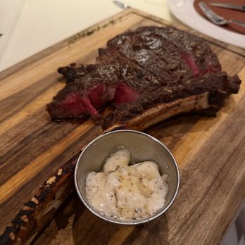 BoVine Steakhouse - Tomahawk Steak with Parmesan crust & Truffle Butter - Steakhouses Near Me - Winter Park, Florida