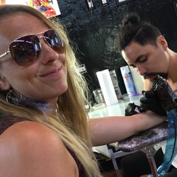 Mr Miyagi's Tattoo & Piercings - The artist at work.