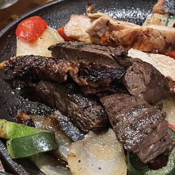 Uncle Julio's - Over done steak from Guadalajara plate - Mexican Near Me - Skokie, Illinois Uncle Julio's - Over done steak from Guadalajara plate - Mexican Near Me - Skokie, Illinois