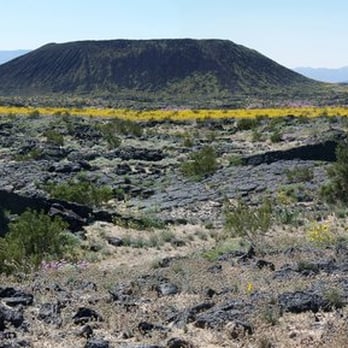 Amboy Crater - The crater in Spring when yellow and purple flowers crisscross the landscape - Hiking Near Me - Amboy, California Amboy Crater - The crater in Spring when yellow and purple flowers crisscross the landscape - Hiking Near Me - Amboy, California