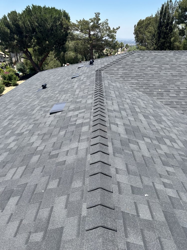 Slide of Meza's Roofing