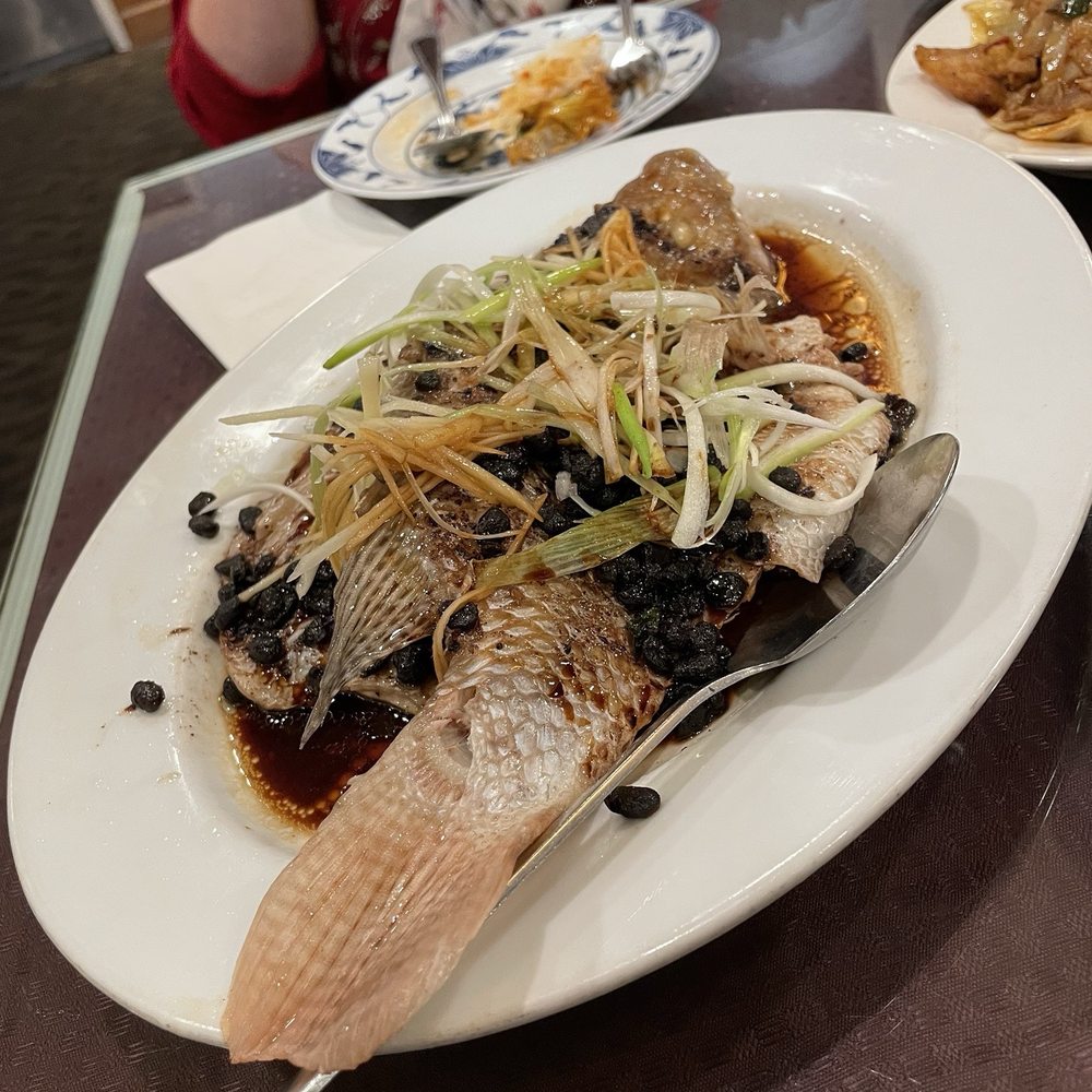 Steamed whole fish with black beans, scallions, and ginger Steamed whole fish with black beans, scallions, and ginger