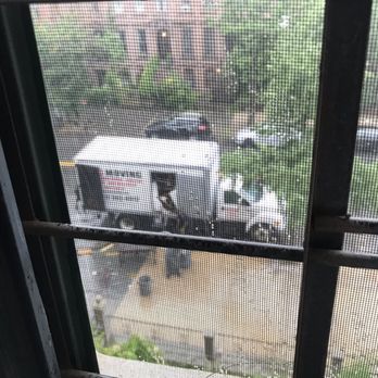 Mac Junk Removal Services - MAC Moving team working through the rain. - Junk Removal & Hauling Near Me - Brooklyn, New York