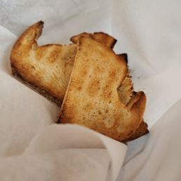 a close up of a piece of bread a close up of a piece of bread