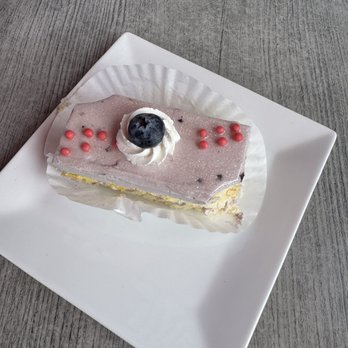 French Bakery Cafe - Blueberry Lemon Slice (took the pic after our spoons took off a couple corners ) - Patisserie/Cake Shop Near Me - Carlsbad, California