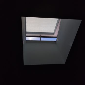 Freelite  - Partially open position (in peak Arizona sun, with frosted glass), controlled by RF Remote, with battery pack and solar sensor. - Windows Installation Near Me - Phoenix, Arizona