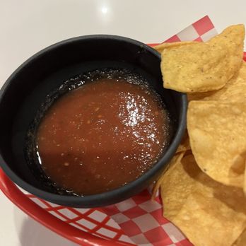 Fuego Cravings - This is my chips and salsa. They brought out very tough and cold chips and well, the salsa yeah pretty empty. - Mexican Near Me - Highland, California Fuego Cravings - This is my chips and salsa. They brought out very tough and cold chips and well, the salsa yeah pretty empty. - Mexican Near Me - Highland, California