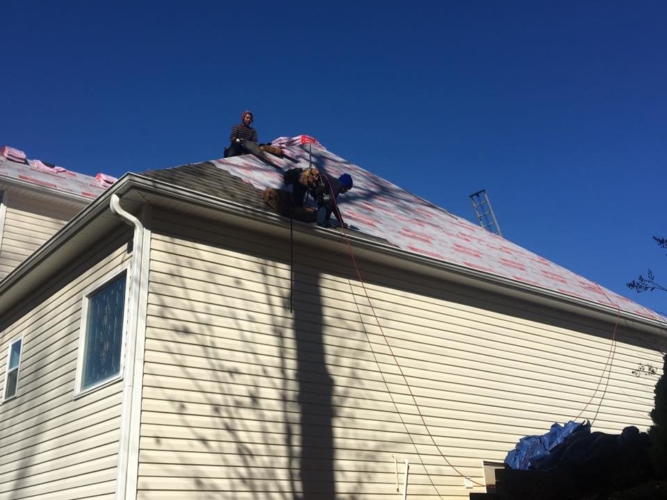 Slide of Rainblocker Roofing & Construction