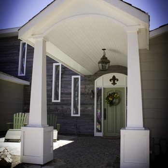 Waters Edge Construction - front entry with new reclaimed lumber siding - General Contractors Near Me