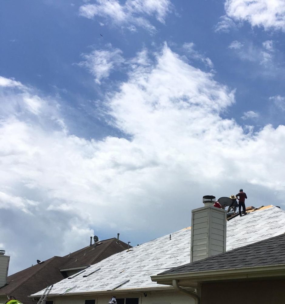 Slide of Johnny's Roofing and storm restoration