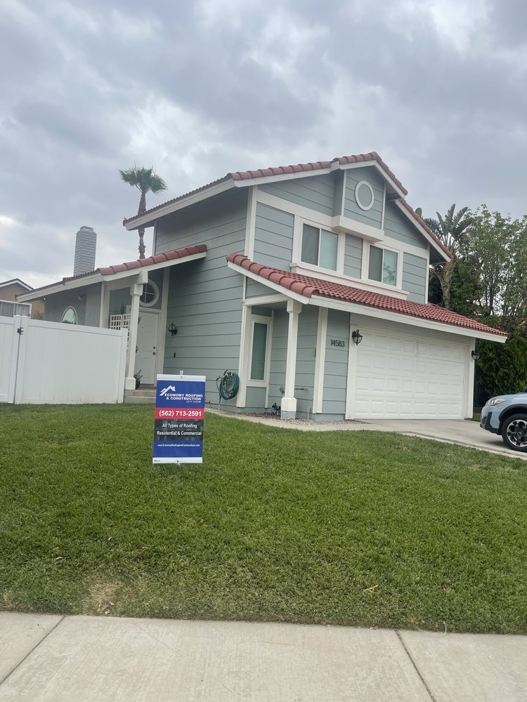 Slide of Pacific Roofing