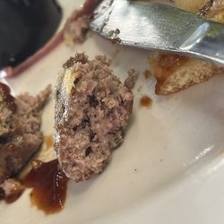 Fitters 5th Street Pub - Raw burger, after it had been sent back once