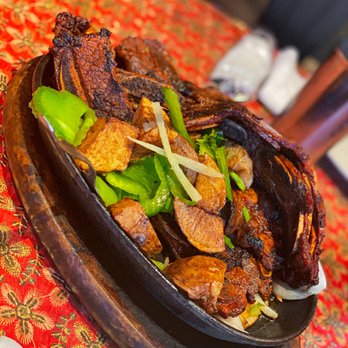 Lahore Tikka House - a plate of food on a table - Halal Near Me - Toronto, Ontario Lahore Tikka House - a plate of food on a table - Halal Near Me - Toronto, Ontario