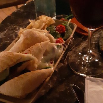 Vino & Vibes - Chicken Panini. Cheesy, flavorful, served with kettle chips, greens and grape tomatoes. - Wine Bars Near Me - Utica, Michigan Vino & Vibes - Chicken Panini. Cheesy, flavorful, served with kettle chips, greens and grape tomatoes. - Wine Bars Near Me - Utica, Michigan