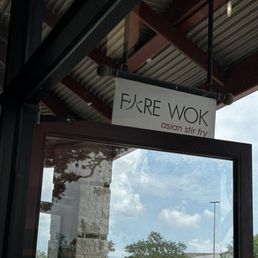 Restaurant sign by the entrance.
