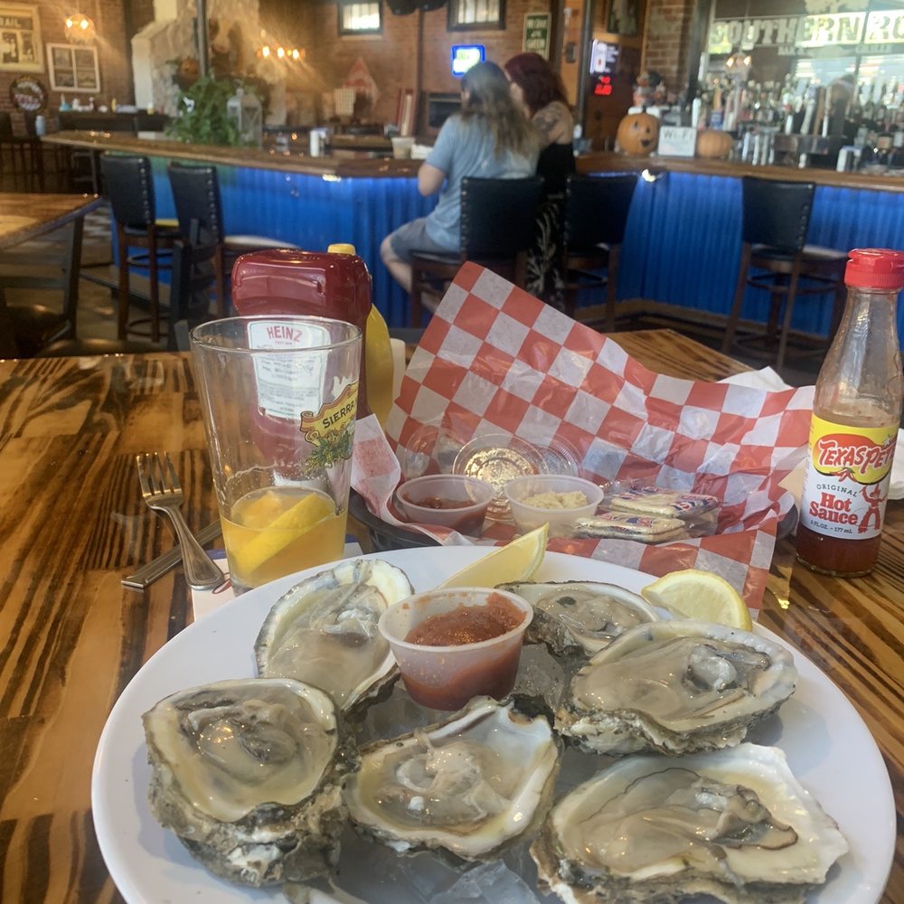 Southern Roots Bar & Grill - a plate of oysters - Bars Near Me - Monroe, North Carolina Southern Roots Bar & Grill - a plate of oysters - Bars Near Me - Monroe, North Carolina