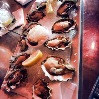 Maximilien - Oysters on the half shell - French Near Me - Seattle, Washington Maximilien - Oysters on the half shell - French Near Me - Seattle, Washington