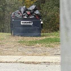 Casella Waste Systems - Unsanitary overflowing trash and garbage in a Casella bin