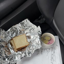 Fasty's BBQ Joint - Slices of white bread and pickles and onions