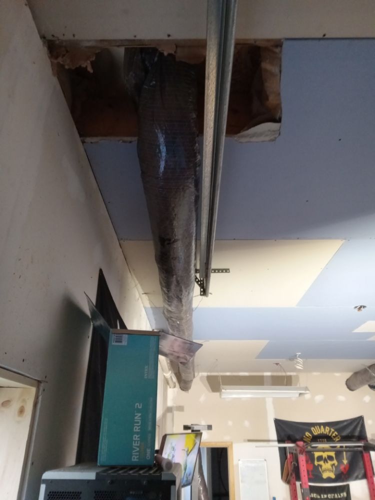 Slide of Kuhn Building services