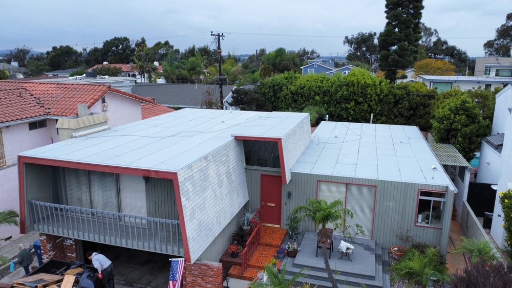 Slide of MMM Roofing