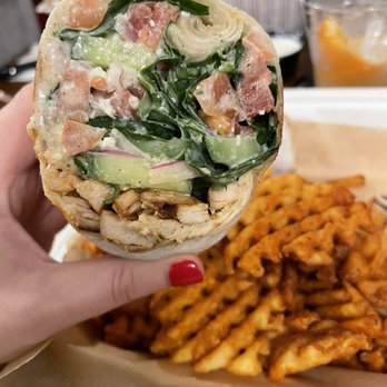 Avenue American Bistro - Chicken feta wrap and waffle fries - Sports Bars Near Me - Wayne, Michigan Avenue American Bistro - Chicken feta wrap and waffle fries - Sports Bars Near Me - Wayne, Michigan
