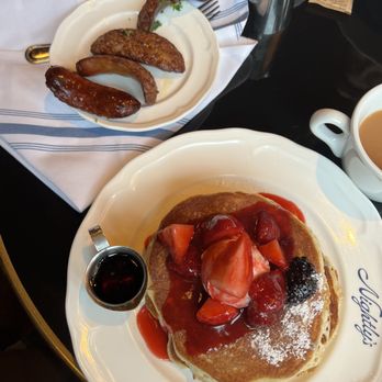 Nightly's - Pancakes with sausages - American Near Me - New York, New York Nightly's - Pancakes with sausages - American Near Me - New York, New York