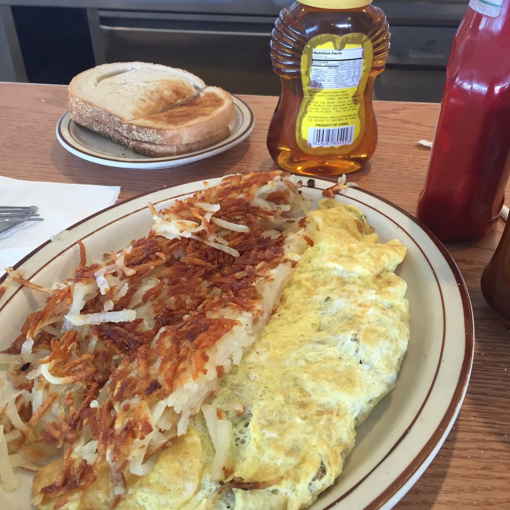 Super bacon and Swiss omelet. Think enough hash browns??? Super bacon and Swiss omelet. Think enough hash browns???