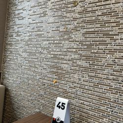 Picked and cheese stuck to the wall